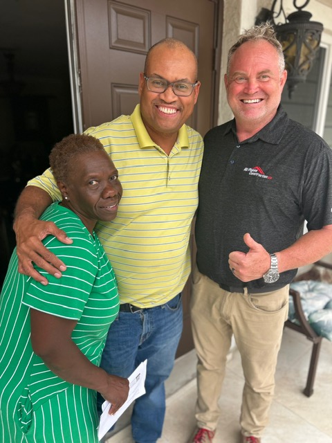 Happy roofing customer in Coral Springs, FL with All Phase Construction USA