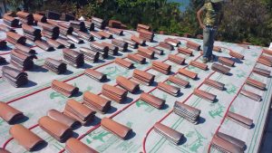 Instaling A tile Roof With Solar Tubing 