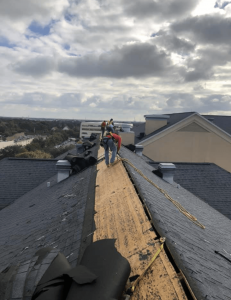 Team Work on a Shingle Roof